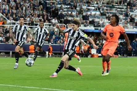 Anthony Gordon scores against Barcelona.