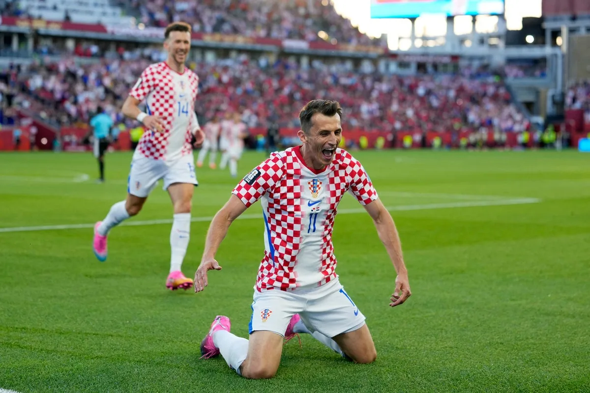 Croatia snatch second by beating Ghana but both through to World Cup knockout stage