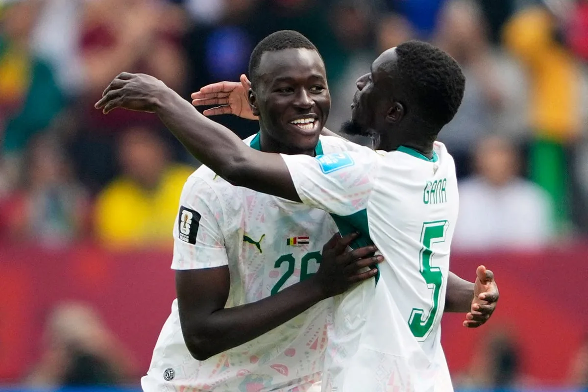 Senegal salvage hopes of a place in World Cup last 32 with thrashing of Iraq