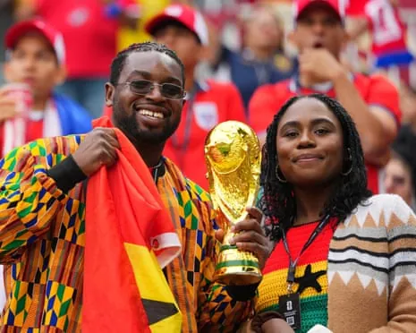 Ghana fans with a replica World Cup.