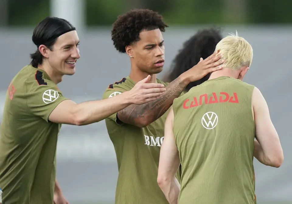 Tajon Buchanan, centre, jokes around with Liam Millar, right, and Alfie Jones during Team Canada World Cup roster selection camp in Charlotte, N.C., on Tuesday, May 26, 2026. THE CANADIAN PRESS/Nathan Denette - The Canadian Press