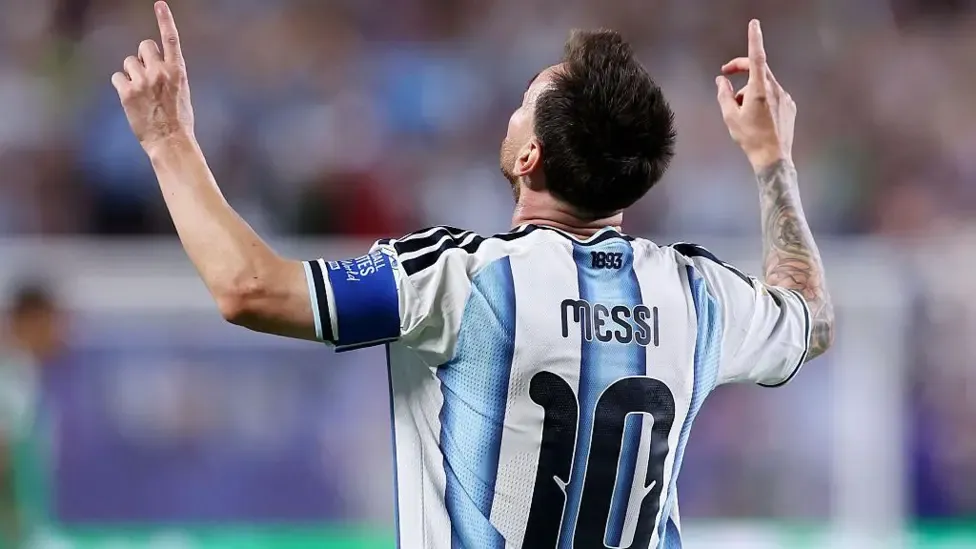 Lionel Messi points his fingers to the sky in celebration after scoring against Algeria in Argentina's 3-0 victory at the 2026 Fifa World Cup
