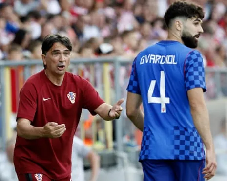 Croatia’s head coach, Zlatko Dalic, gives instructions to Josko Gvardiol during a friendly against Belgium last week