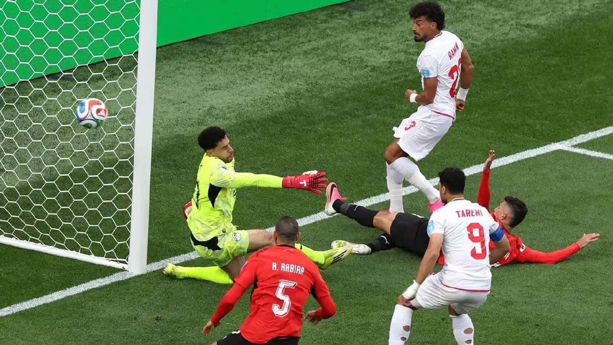 Egypt goalkeeper Mostafa Shoubir was unable to stop Ramin Rezaeian scoring Iran's equaliser. (AP PHOTO)