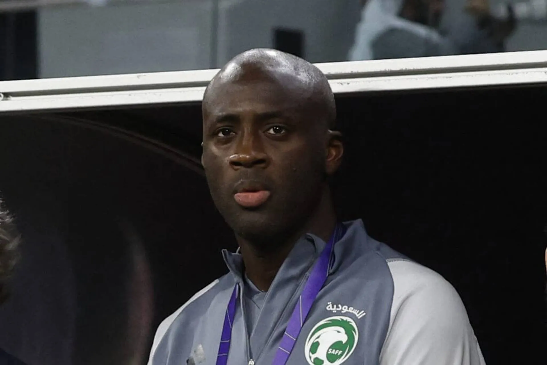 Yaya Toure looks on from the Saudi Arabia national team touchline