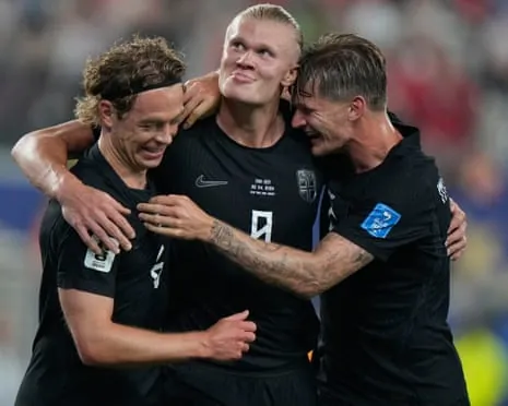 Norway's Erling Haaland celebrates with Patrick Berg, left, and David Moeller Wolfe, right after scoring their third goal