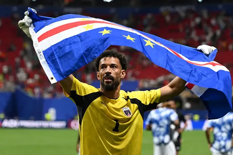 Cape Verde's Vozinha with teammates after the match