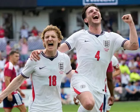Anthony Gordon and Declan Rice celebrate together