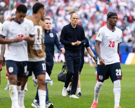 The England head coach, Thomas Tuchel, leaves the field with his team after the World Cup draw against Ghana.