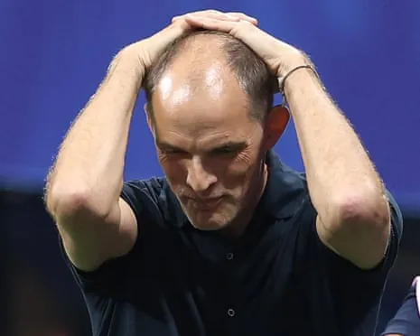Thomas Tuchel puts his hands on his head in anguish during England's defeat by Argentina.