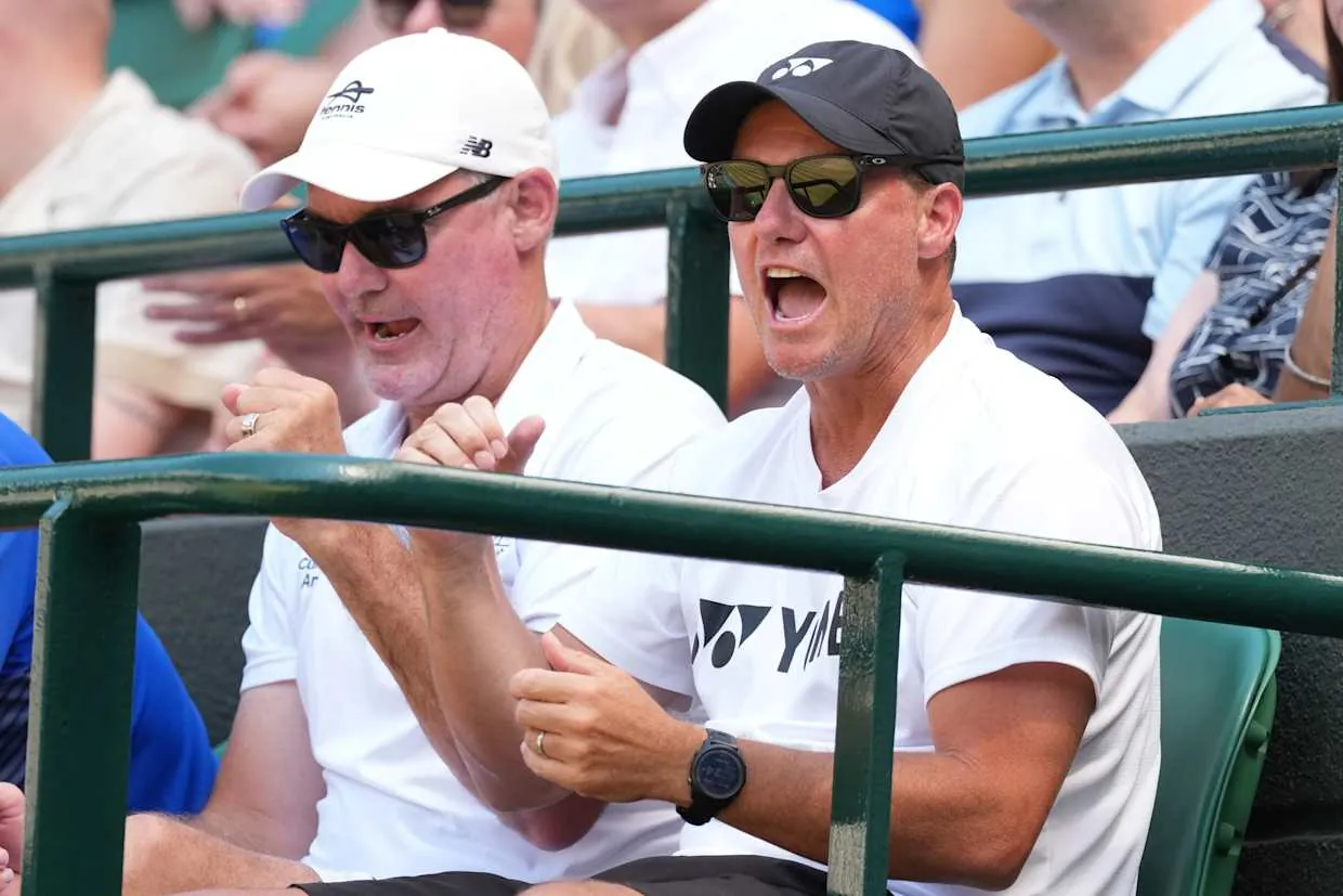 Lleyton Hewitt in the coach’s box watched on anxiously as his son put up a tremendous fight.AP Photo/Dave Shopland