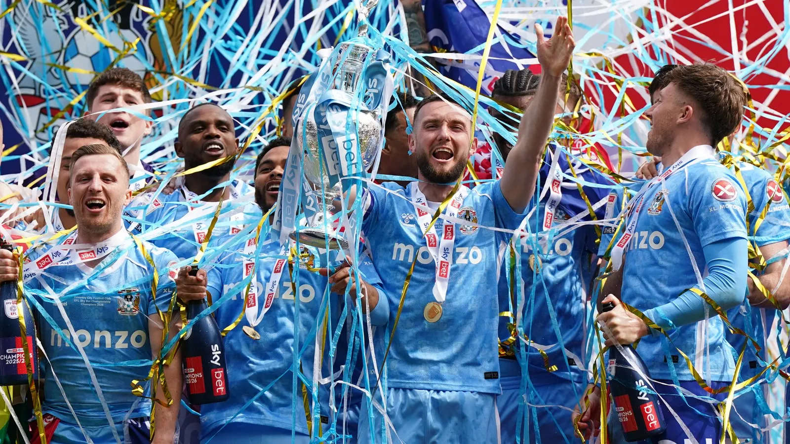 Coventry celebrate with the Championship trophy