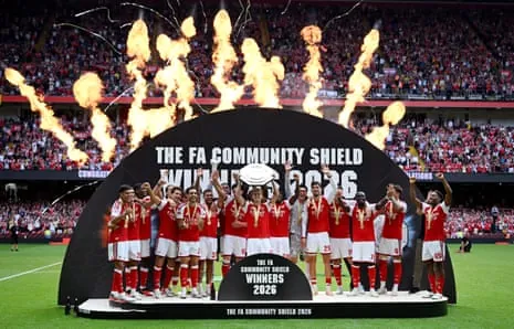 Martin Ødegaard lifts the Community Shield trophy
