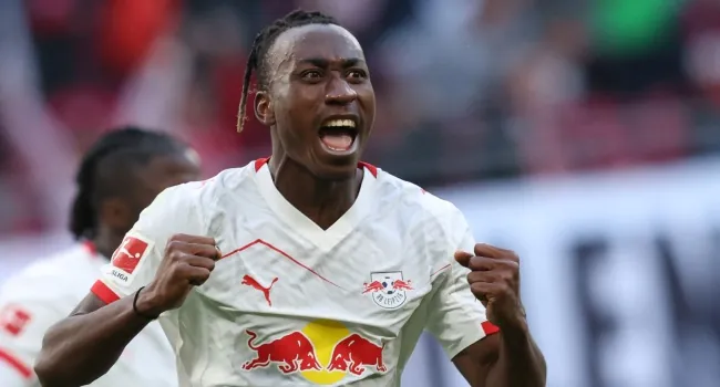 Ex-Leipzig Ivorian forward #49 Yan Diomande celebrates scoring the 1-1 goal during the Bundesliga football match between RB Leipzig and Augsburg in Leipzig, eastern Germany on March 7, 2026.