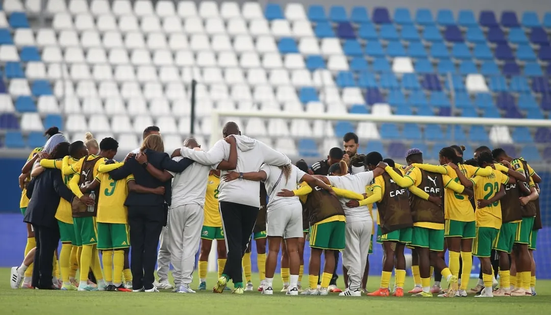 Banyana Banyana players in a hurdle after the match.