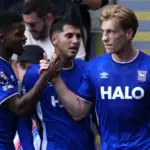 Ipswich score late to defeat 10-man Crystal Palace