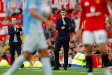 Michael Carrick looks on from the touchline during the Manchester derby.