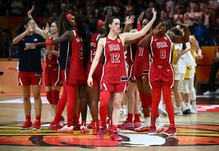 Caitlin Clark and her USA teammates celebrate after beating Spain 76-66 to reach the Fiba Women’s Basketball World Cup final in Berlin.