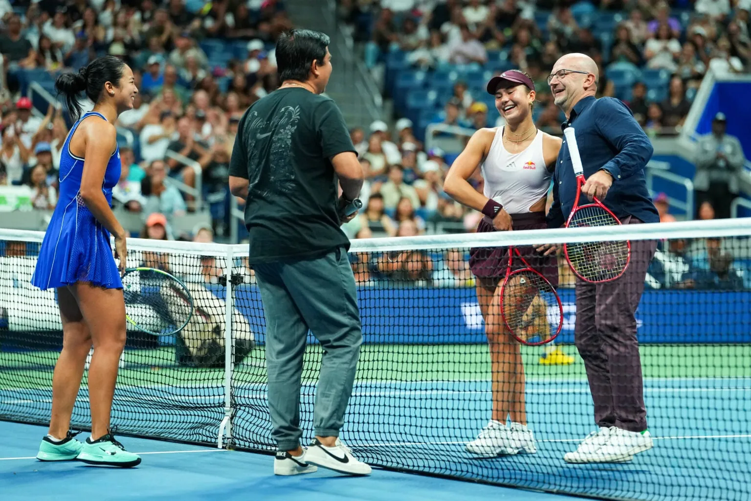 Alex Eala and Iva Jovic play tennis with their parents on Arthur Ashe Stadium in 2026.