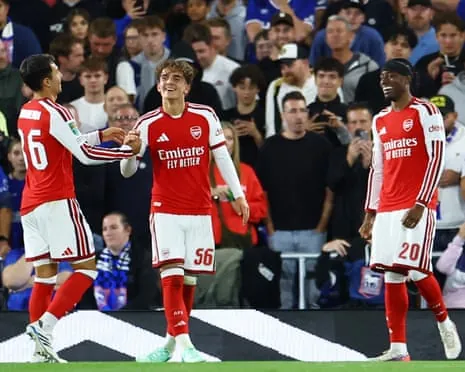 Arsenal's Max Dowman celebrates a goal with teammates Martin Zubimendi and Noni Madueke